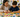 Child and adult sorting learning cards by color, shape, and symbol.