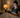Adult using a tablet in a calm evening bedroom routine.